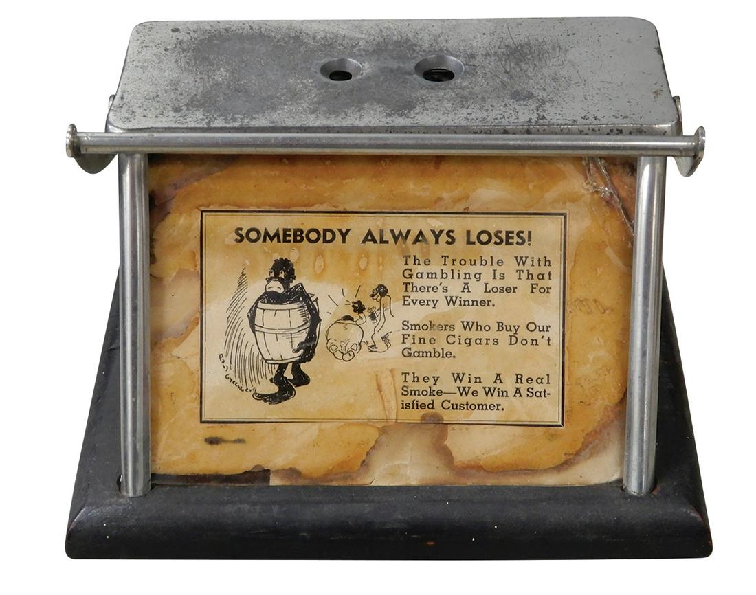 Cigar Cutter, Brunhoff-Cinc, O., iron & brass on wood base w/adv panel "Somebody Always Loses!",: Cigar Cutter, Brunhoff-Cinc, O., iron & brass on wood base w/adv panel "Somebody Always Loses!", has push down bar for cutter, c.1920, chip out of upper Rt glass, o/wise Good orig working cond, 5"H x 