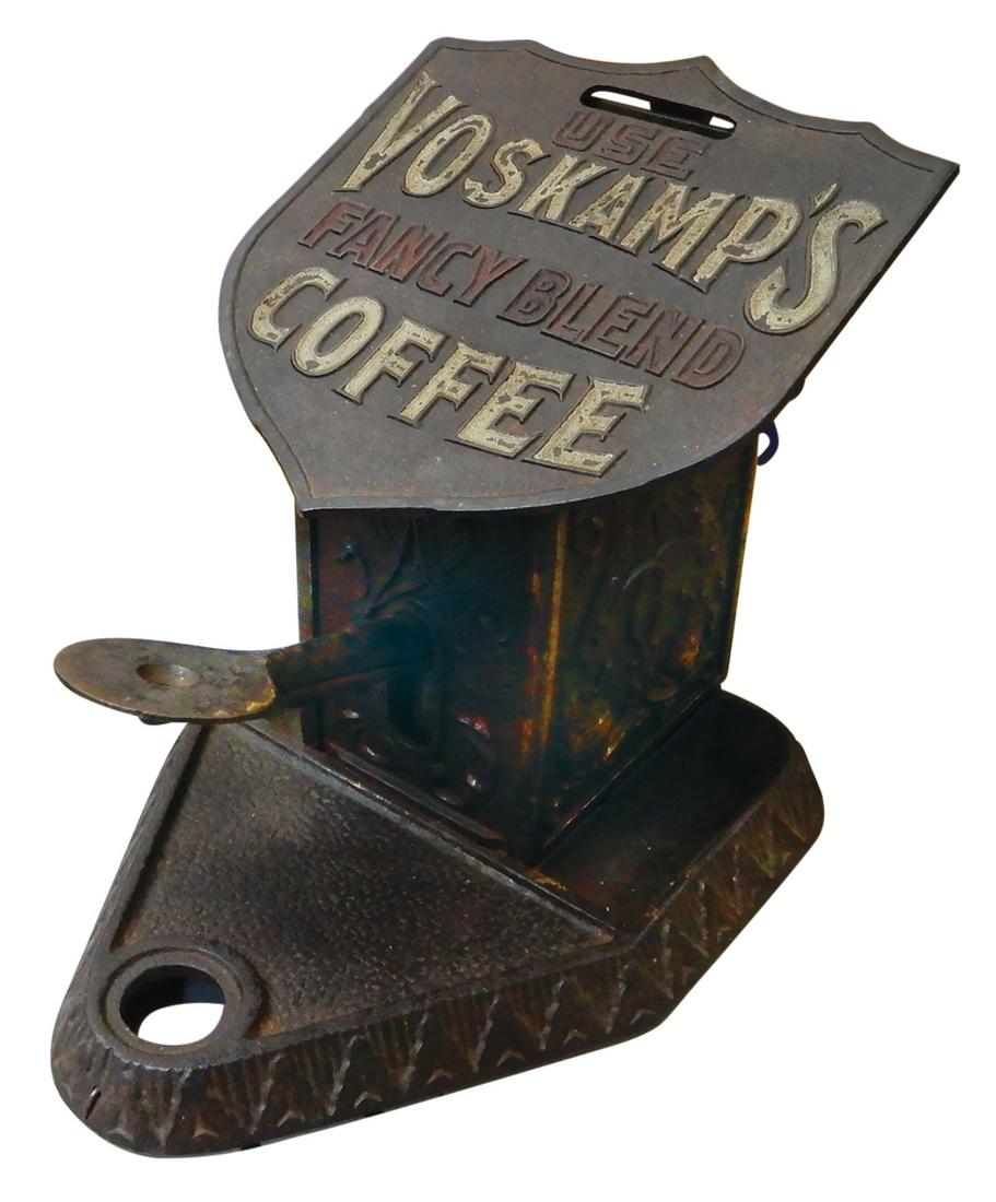 Cigar Cutter, Voskamp's Fancy Blend Coffee mfgd by Northwestern Novelty-Morris, IL, cast iron: Cigar Cutter, Voskamp's Fancy Blend Coffee mfgd by Northwestern Novelty-Morris, IL, cast iron w/mechanical match dispenser, c.1910, VG+ orig cond, 7"H x 6"W x 8"D.