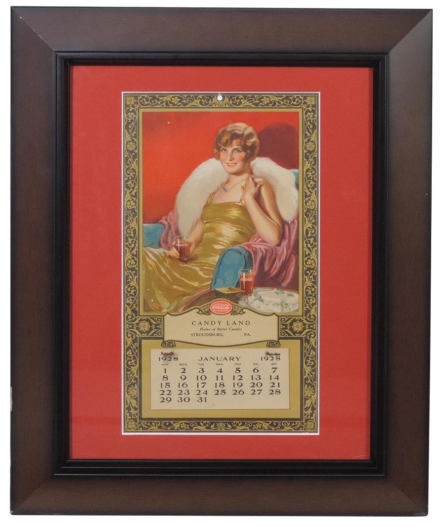 Coca-Cola Calendar 1928, Candyland-Stroudsburg, PA, pad complete sans cover sheet, VG+ cond w/1.5": Coca-Cola Calendar 1928, Candyland-Stroudsburg, PA, pad complete sans cover sheet, VG+ cond w/1.5" diagonal crease upper left corner, few small scattered nicks & corner bumps, the latter under mat, fr