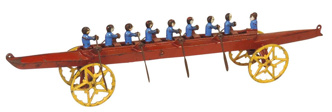Toy 9-Man Rowing Scull Pull Toy, cast iron, mfgd by US Hardware, Rare, VG+ working cond w/orig: Toy 9-Man Rowing Scull Pull Toy, cast iron, mfgd by US Hardware, Rare, VG+ working cond w/orig paint, 16.5"L.
