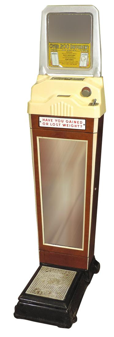Coin-Operated Penny Fortune Scale, enameled cast iron & wood grained pressed steel, mfgd by Watling,: Coin-Operated Penny Fortune Scale, enameled cast iron & wood grained pressed steel, mfgd by Watling, VG working cond w/keys, 67"H x 17"W x 25"D.