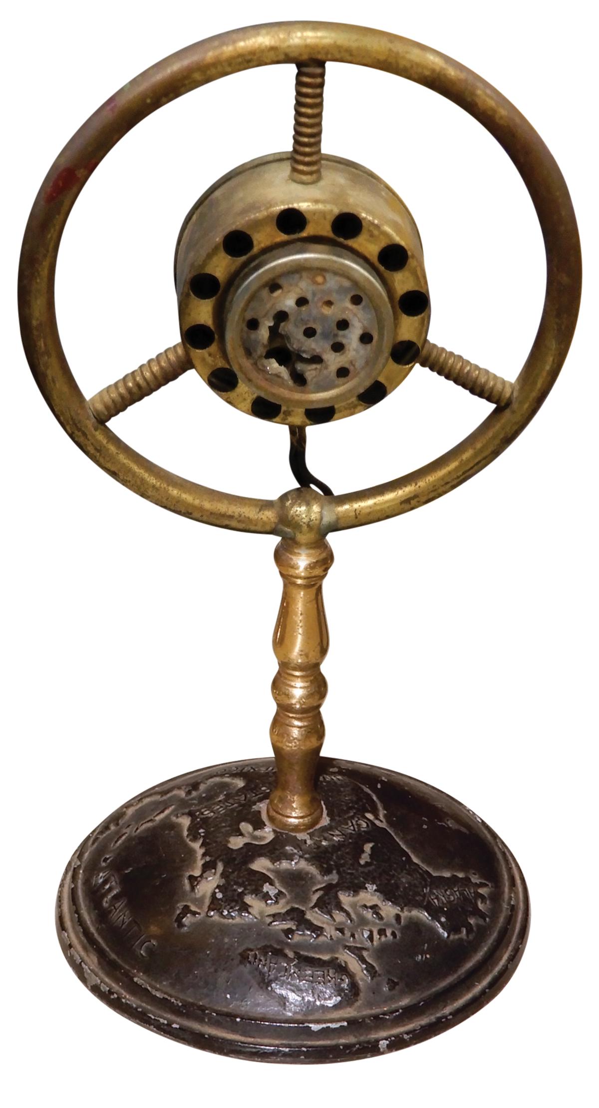 Cigar Lighter, "Microphone", electric, brass w/white metal base showing cast shape of globe top,: Cigar Lighter, "Microphone", electric, brass w/white metal base showing cast shape of globe top, raised letters Pacific, U.S., Mexico, Atlantic, etc., c.1920, Good orig cond, needs mica in microphone 