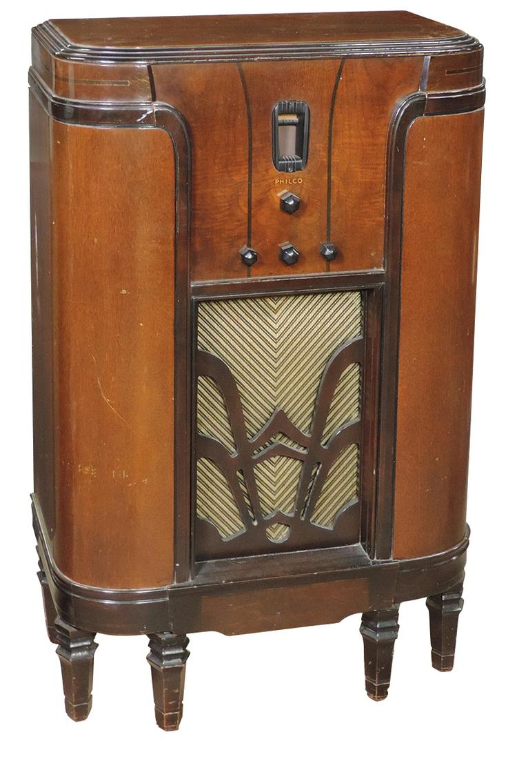 Radio, Philco Console Model 36 in Art Deco style mahogany case, VG+ orig finish & cond (radio powers: Radio, Philco Console Model 36 in Art Deco style mahogany case, VG+ orig finish & cond (radio powers up w/seized turner), 39"H x 25"W x 14"D.