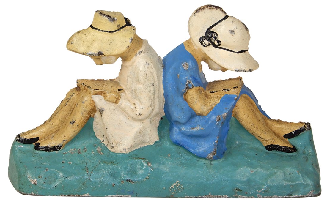 Doorstop, Girls Reading Books, polychrome cast iron figure of 2 girls back to back, Exc cond w/orig: Doorstop, Girls Reading Books, polychrome cast iron figure of 2 girls back to back, Exc cond w/orig paint, 5"H x 8.5"W.