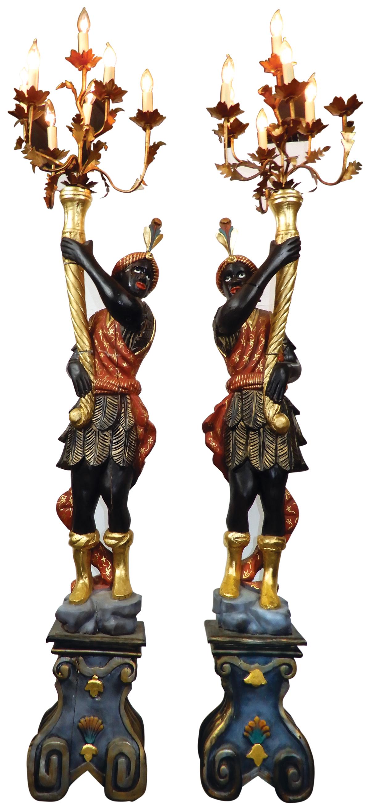 Lighting (2), figural Blackamoor candelabra, carved, polychrome & gilt wood, each turbaned figure: Lighting (2), figural Blackamoor candelabra, carved, polychrome & gilt wood, each turbaned figure supporting a cornucopia terminating w/scroll arm & foliate electric candle arm, VG cond w/some wear, r