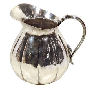 Silver On Copper Handled Pitcher, designed by Hans Grag, hand-wrought, marked #1189, minor short: Silver On Copper Handled Pitcher, designed by Hans Grag, hand-wrought, marked #1189, minor short scratches consistent w/age & handling, impressed marks on base, VG+ cond, 7.5"H x 8"W.