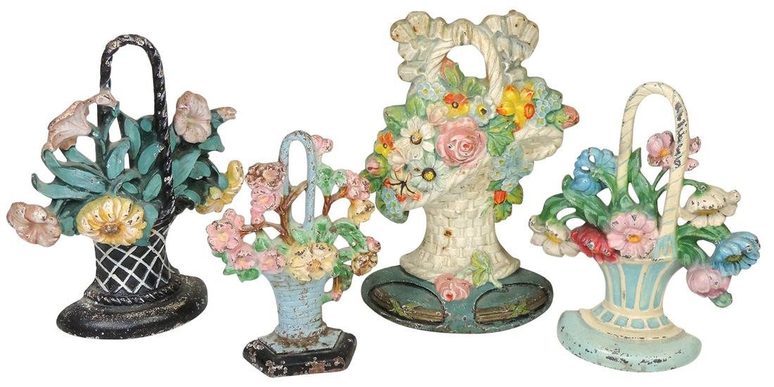 Doorstops (4), Flower Baskets, most Hubley, incl Petunias & Apple Blossoms, all cast iron, most VG: Doorstops (4), Flower Baskets, most Hubley, incl Petunias & Apple Blossoms, all cast iron, most VG or VG+ cond, largest 10.25"H.