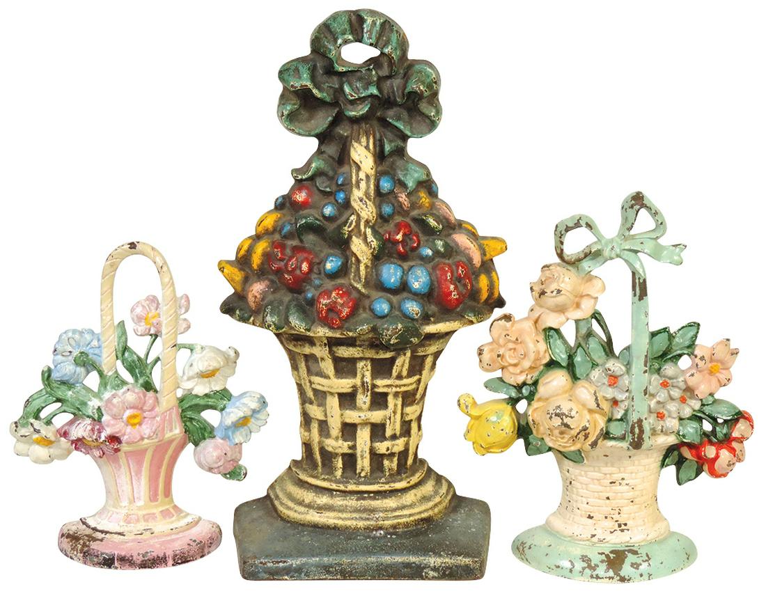 Doorstops (3), all Hubley, incl Fruit Basket & Rose Basket, cast iron w/orig paint, VG cond, largest: Doorstops (3), all Hubley, incl Fruit Basket & Rose Basket, cast iron w/orig paint, VG cond, largest 15"H.
