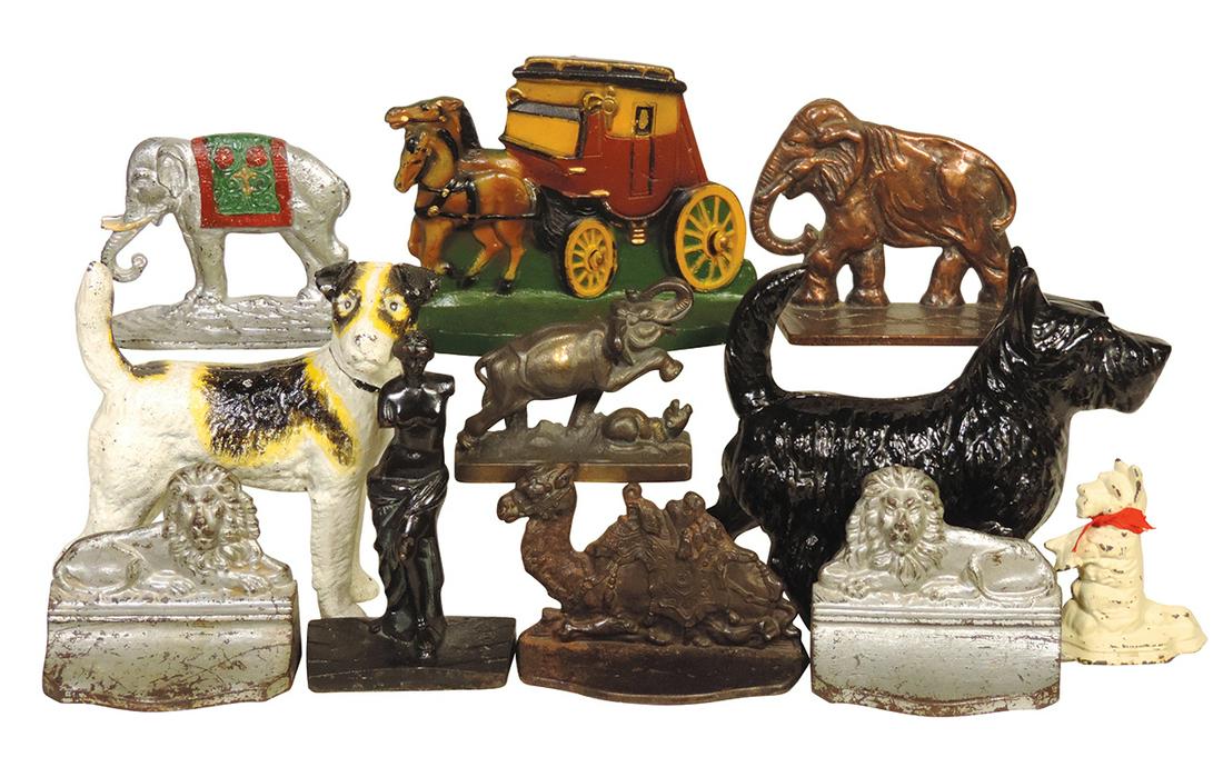 Doorstops (11), 2 full bodied dogs, English Coach, Scotty Wedge, Camel & Elephants, all cast iron,: Doorstops (11), 2 full bodied dogs, English Coach, Scotty Wedge, Camel & Elephants, all cast iron, most VG or VG+ cond, largest 8.5"H.