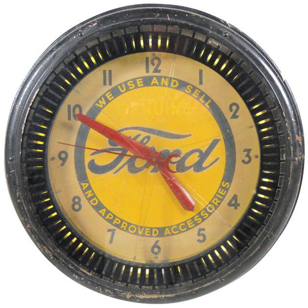 Ford neon motion clock, "We Use & Sell Ford Approv: Ford neon motion clock, "We Use & Sell Ford Approved Accessories", VG working cond w/wear on case & brittle cord, 21"Dia.
