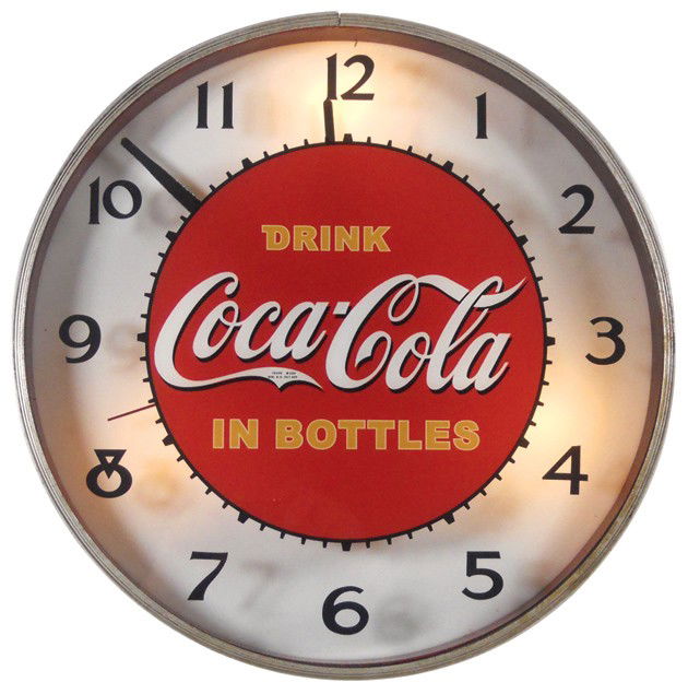 Coca-Cola light-up clock, round metal case w/Drin: Coca-Cola light-up clock, round metal case w/Drink Coca-Cola in Bottles glass face, mfgd by Lackner, Exc restored cond w/orig Lackner label, 17"Dia.