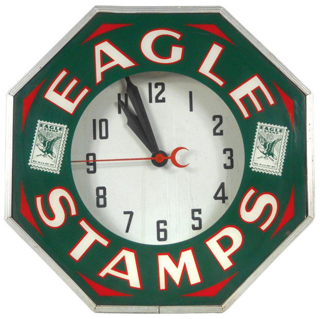 1229 Eagle Stamps neon clock, mfgd by Neon Products In