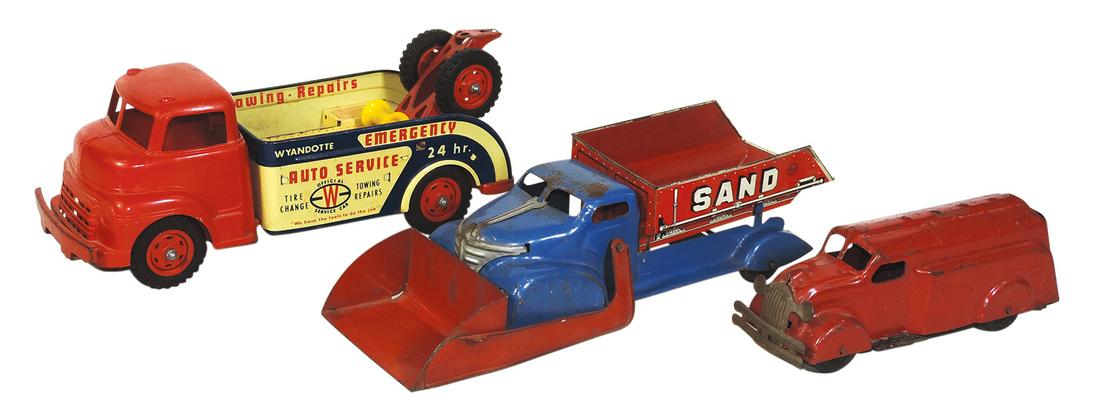 Toy Trucks (3), Wyandotte wrecker w/litho on tin box w/plastic cab (missing part of boom), Marx Sand (1 of 1)