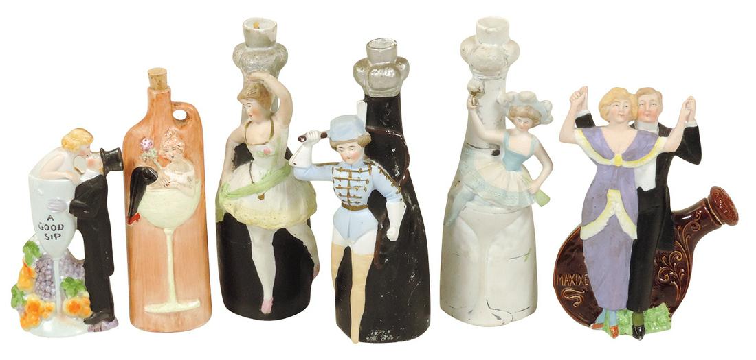 Porcelain Schafer & Vater Figural Flasks or Nips (6), German, all w/beautiful women,: Porcelain Schafer & Vater Figural Flasks or Nips (6), German, all w/beautiful women, 1 marked A Good Sip, another Maxixe, 1 w/porcelain stopper, all VG & Exc cond, 5" to 7"H.