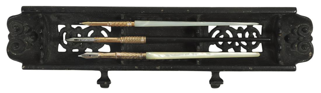 Dip Pens & Pen Holder (4), Spencerian #1 gold & wood handle, (2) gold w/Mother of Pearl handles &: Dip Pens & Pen Holder (4), Spencerian #1 gold & wood handle, (2) gold w/Mother of Pearl handles & cast iron pen display holder embossed Tatum, c.1890's, all in VG & Exc untested cond, holder 10"L x 2.