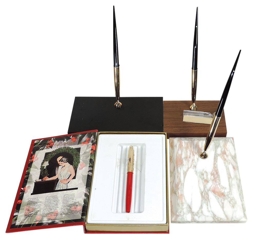 Desk Pen Sets (4), Sheaffer: fountain pen set on jet crystal base, 1996 Holly red ballpoint, 1: Desk Pen Sets (4), Sheaffer: fountain pen set on jet crystal base, 1996 Holly red ballpoint, 1 ballpoint on wood base & 1 ballpoint on beautiful light marble base, all ballpoints are White Dot, all Ex