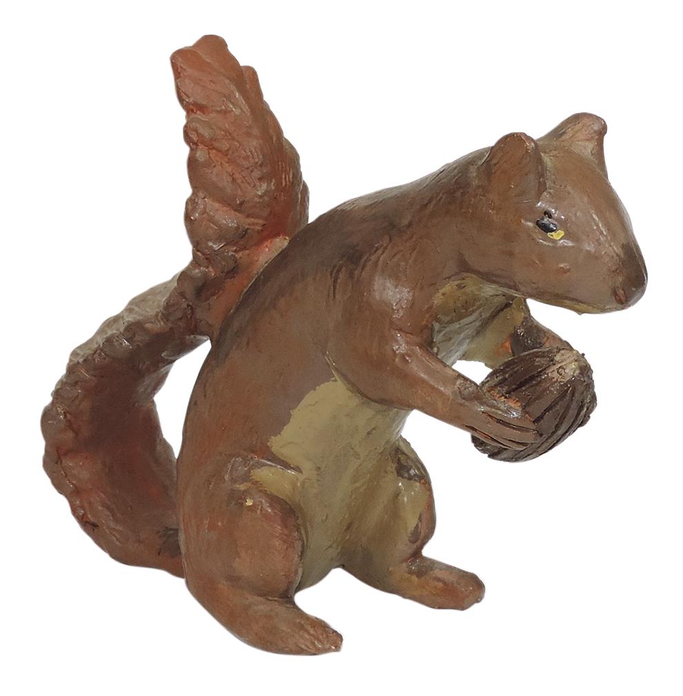 Sewer Tile Lunch Hour Figure, hand-molded squirrel holding a walnut, painted underbelly & eyes,: Sewer Tile Lunch Hour Figure, hand-molded squirrel holding a walnut, painted underbelly & eyes, likely What Cheer Clay Products, early 20th C., VG+ cond w/some light nicks & scrapes, 7.5"H.