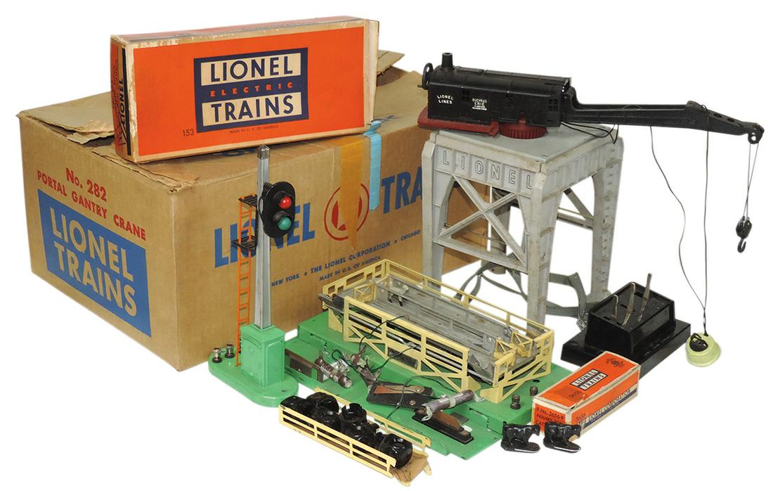 Toy Lionel Train Accessories (3), No. 282 Portal Gantry Crane, No. 153 Signal Block & No. 3656: Toy Lionel Train Accessories (3), No. 282 Portal Gantry Crane, No. 153 Signal Block & No. 3656 Stockyard, Good to Exc untested cond, 1st 2 in orig boxes, largest 16"L.