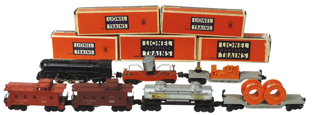 Toy Lionel Train Set (7), Hudson Engine (Good+), 6357 Caboose, 2465 Tank, 6561 Cable, 3620: Toy Lionel Train Set (7), Hudson Engine (Good+), 6357 Caboose, 2465 Tank, 6561 Cable, 3620 Searchlight & 2620 Floodlight, all but 2 in orig boxes, mostly VG to Exc untested cond unless noted, largest 