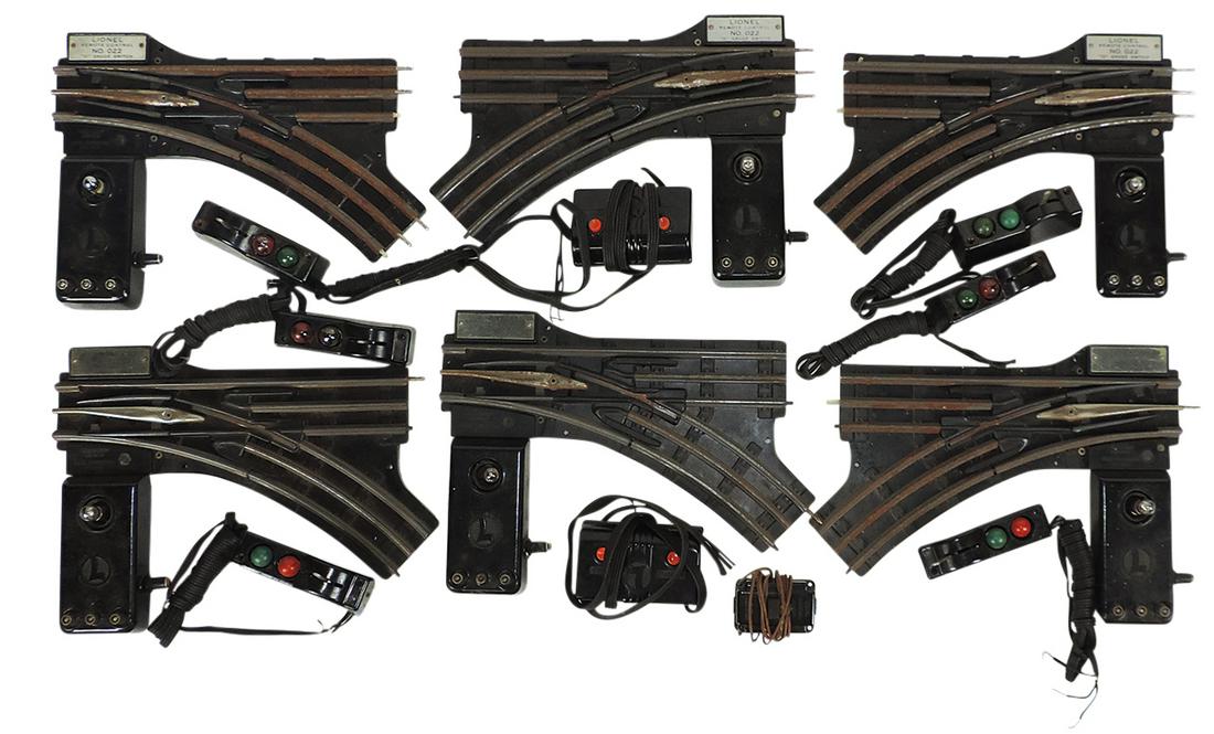 Toy Lionel Train Switches & Controllers (12), 6 track switches No. 022 & variety of remote controls,: Toy Lionel Train Switches & Controllers (12), 6 track switches No. 022 & variety of remote controls, Good+ to VG cond, largest 11"L.