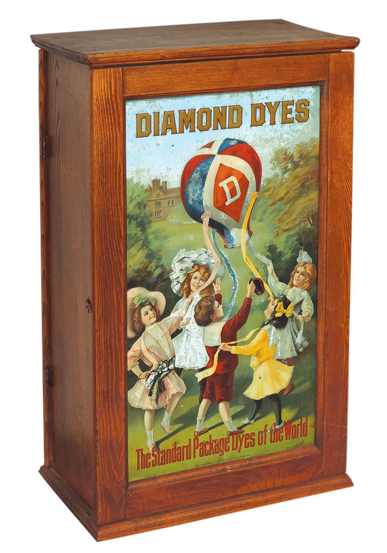 Country Store Diamond Dyes Cabinet, "Children w/Balloon", litho on embossed tin panel in oak: Country Store Diamond Dyes Cabinet, "Children w/Balloon", litho on embossed tin panel in oak cabinet, door at front & 1 at back to fill w/product, interior cubicles present, c.1910, VG cond w/some oxi