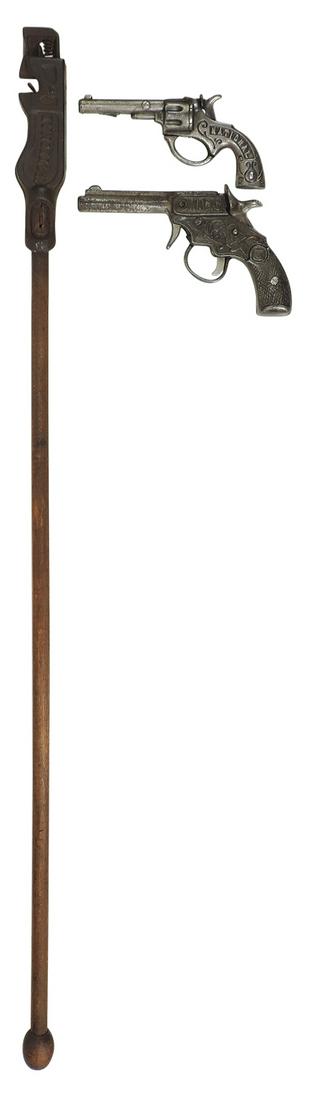 Toy Cap Guns (3), by National incl wood shaft Cap Cane, Magic pistol & another, all cast iron,: Toy Cap Guns (3), by National, wood shaft Cap Cane, Magic pistol & another, all cast iron in VG working cond, largest 29"L.