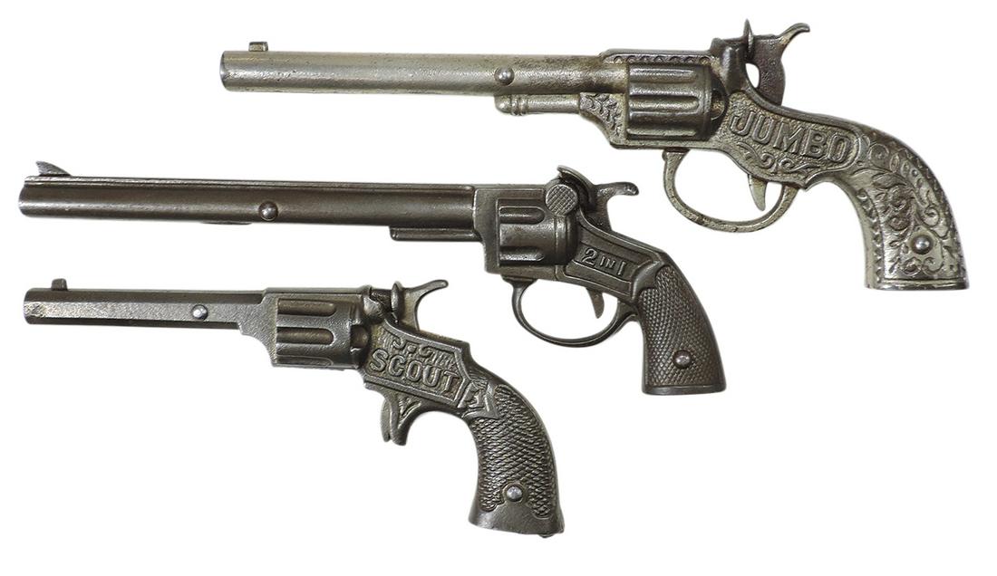 Toy Cap Guns (3), Jumbo, Scout & 2-in-1, all cast iron, mfgd by Stevens, 1920s-30s, VG cond,: Toy Cap Guns (3), Jumbo, Scout & 2-in-1, all cast iron, mfgd by Stevens, 1920s-30s, VG cond, noting 1st w/worn catch spring, others working, largest 10"L.