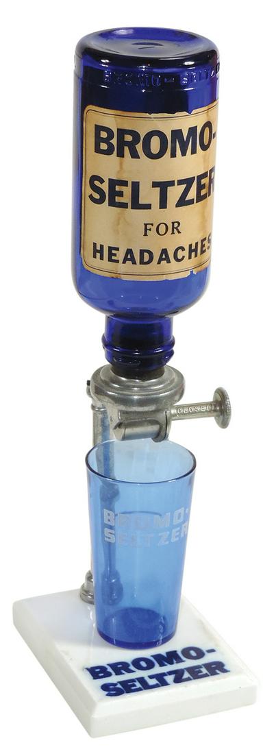 Drug Store Bromo-Seltzer Dispenser, unusual white porcelain base w/cobalt Bromo-Seltzer advertising,: Drug Store Bromo-Seltzer Dispenser, unusual white porcelain base w/cobalt Bromo-Seltzer advertising, early Bromo Seltzer for Headaches cobalt bottle w/orig paper labels & blue Bromo glass, all Exc con