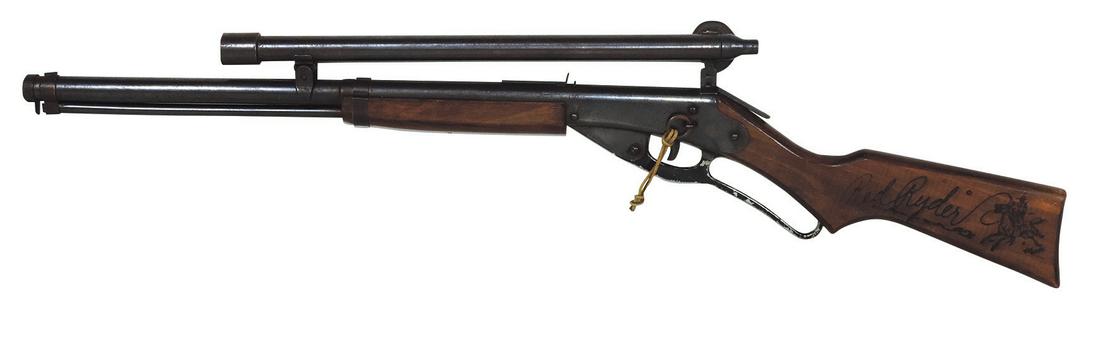 Air Rifle, Daisy Red Ryder, No. 311 Model 40 Var. 4 w/scope, wood stock & forearm grip, Exc working: Air Rifle, Daisy Red Ryder, No. 311 Model 40 Var. 4 w/scope, wood stock & forearm grip, Exc working cond w/some medium wear spots, 36"L.