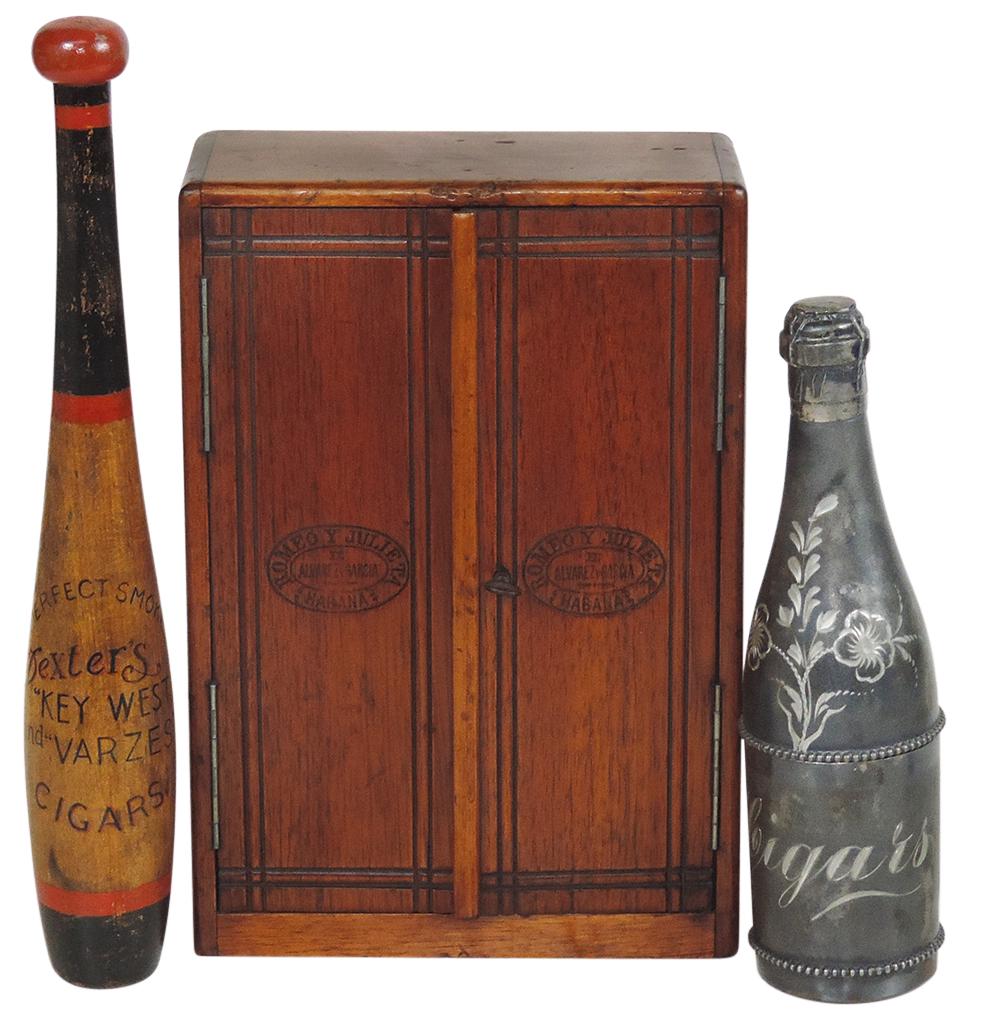 Cigar Advertising & Humidors (3), decorated Indian Club lettered "Dexter's Key West & Varzes: Cigar Advertising & Humidors (3), decorated Indian Club lettered "Dexter's Key West & Varzes Cigars", engraved silverplated champagne bottle-form cigar holder & 2-door locking cigar box stamped Romeo