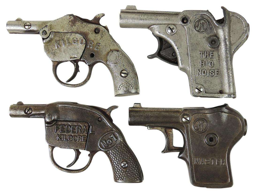 Toy Cap Guns (4), cast iron automatics, all different auto roll shooters by National incl Federal: Toy Cap Guns (4), cast iron automatics, all different auto roll shooters by National incl Federal No.1, Master & Big Noise, Good+ to VG working cond, largest 6"L.