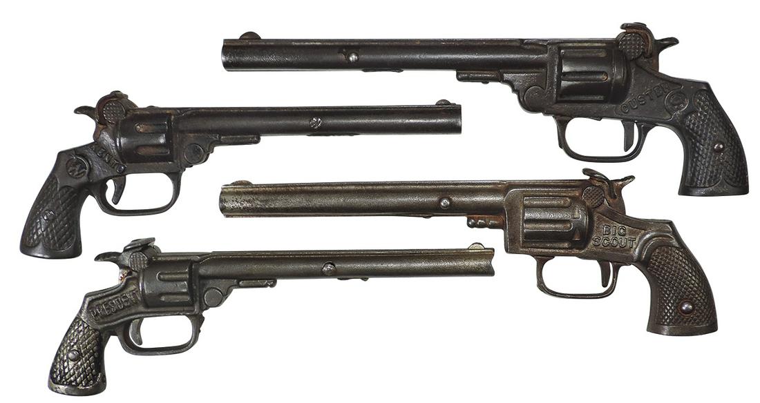 Toy Cap Guns (4), cast iron long barrels: Custer, Big Scout, President plus unnamed, mfgd by: Toy Cap Guns (4), cast iron long barrels: Custer, Big Scout, President plus unnamed, mfgd by Kenton, c.1920s, VG or better working cond, largest 10.25".