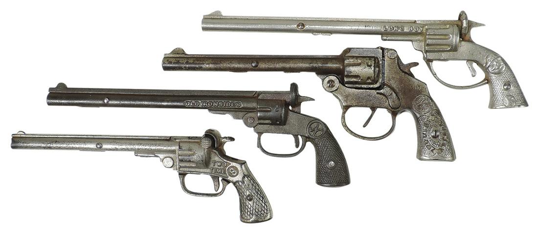 Toy Cap Guns (4), cast iron Long Boy & Trooper Safety, mfgd by Kilgore; Two Time by Kenton & Old: Toy Cap Guns (4), cast iron Long Boy & Trooper Safety, mfgd by Kilgore; Two Time by Kenton & Old Ironsides by National, Good+ to Exc working cond, largest 11"L.