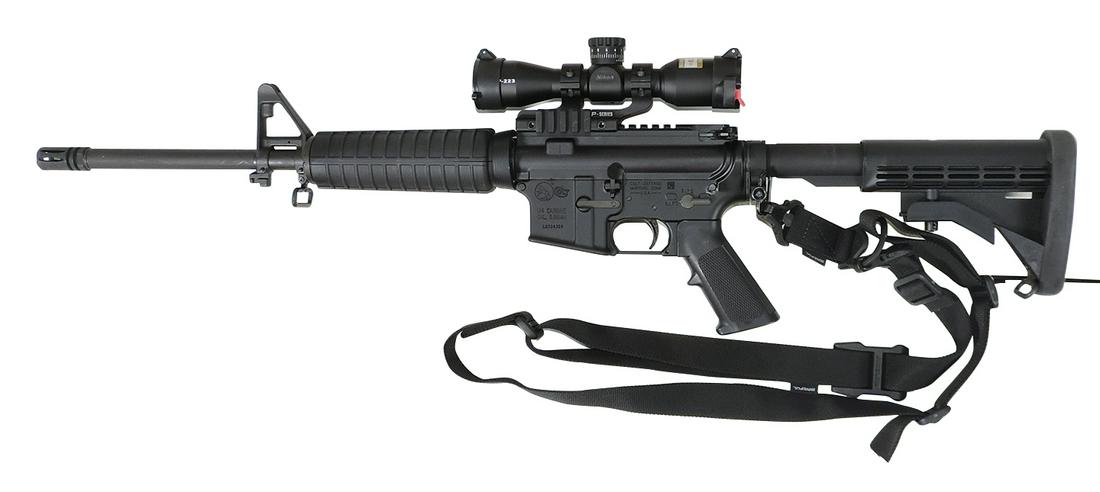 Firearm, Colt M4 Carbine, semi-automatic 5.56mm, standard military issue w/collapsible shoulder: Firearm, Colt M4 Carbine, semi-automatic 5.56mm, standard military issue w/collapsible shoulder stock, fitted w/Nikon P-223 scope, Magpul sling, soft carry case & bandolier w/6 Magpul 20 round magazin