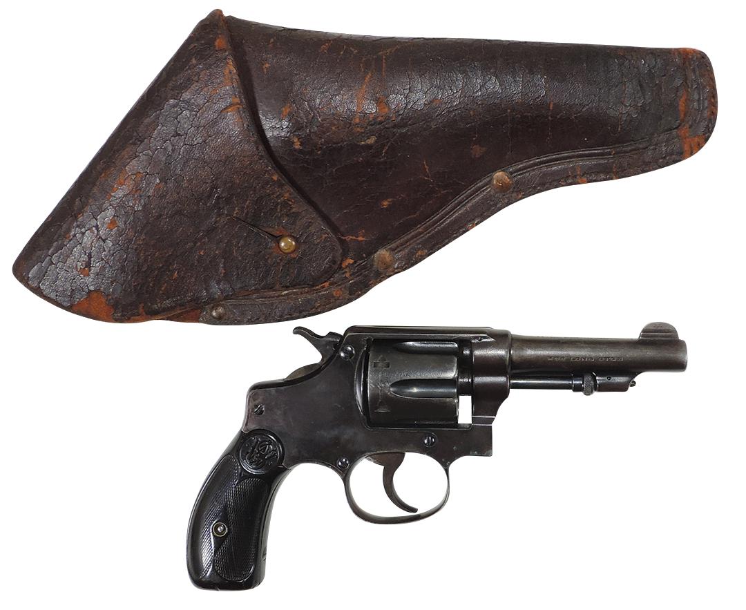 Firearm, Smith & Wesson Model 1914 Revolver, .32 cal long, 3.25" barrel, in leather holster, VG+: Firearm, Smith & Wesson Model 1914 Revolver, .32 cal long, 3.25" barrel, in leather holster, VG+ cond, 8.25"L.