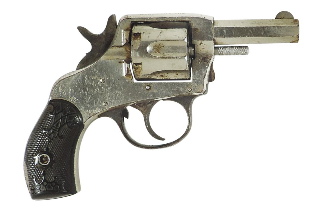 Firearm, Revolver, H & R Arms Co., Worcester, Mass, The American double action, .38 cal center fire: Firearm, Revolver, H & R Arms Co., Worcester, Mass, The American double action, .38 cal center fire 6 shot, 2" hex barrel, Serial #5230 on bottom left gun frame & marked in both grips, orig factory ha