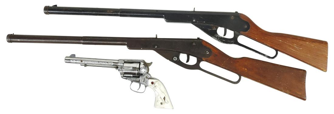 Air Rifles & Cap Gun (3), 2 Daisy No. 102 Model 36 500 shot & Nichols Stallion six shooter, Good+ to: Air Rifles & Cap Gun (3), 2 Daisy No. 102 Model 36 500 shot & Nichols Stallion six shooter, Good+ to VG working cond, the latter w/weak action, largest 32"L.