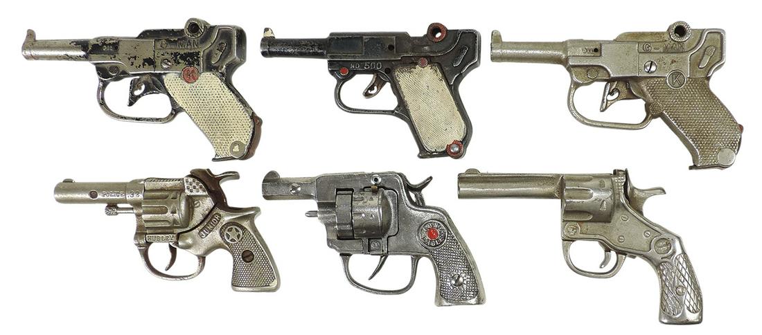 Toy Cap Guns (6), cast iron, Hubley Jr., Kilgore Lone Eagle, 2 Kenton G-Man & others, Good to VG: Toy Cap Guns (6), cast iron, Hubley Jr., Kilgore Lone Eagle, 2 Kenton G-Man & others, Good to VG cond, largest 6.5"L.