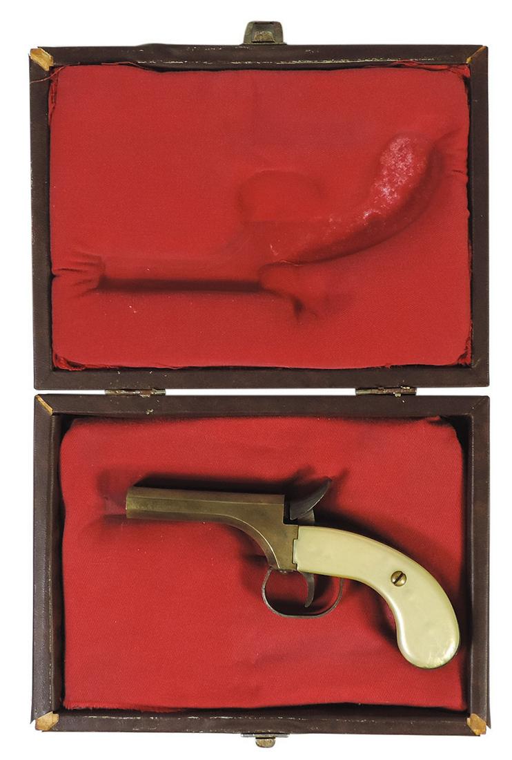 Firearm, double barrel Percussion Derringer, brass .36 cal, mfgd by CMC w/simulated mother of pearl: Firearm, double barrel Percussion Derringer, brass .36 cal, mfgd by CMC w/simulated mother of pearl grips, VG+ working cond in later fitted case, 6.75"L (derringer).