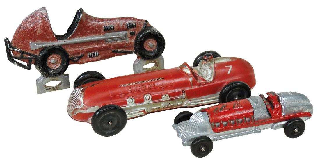 Toy Racers (3), die-cast #22 w/cast iron insert & driver, #7 Auburn rubber & flat cast aluminum: Toy Racers (3), die-cast #22 w/cast iron insert & driver, #7 Auburn rubber & flat cast aluminum license plate topper, VG to Exc cond, largest 10.5"L.