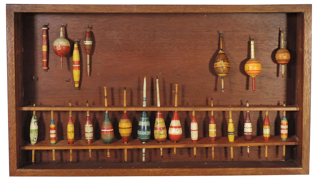 Fishing (22), folk art wood bobbers, turned & painted wood vintage slip floats in variety of sizes &: Fishing (22), folk art wood bobbers, turned & painted wood vintage slip floats in variety of sizes & forms, displayed in custom wall-hung mahogany case, mostly VG cond, 16"H x 28"W overall.