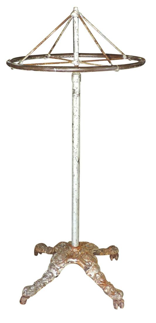 Clothing Store Garment Rack, iron w/ornate cast iron 4-legged base supporting a rotating wheel, Good (1 of 1)