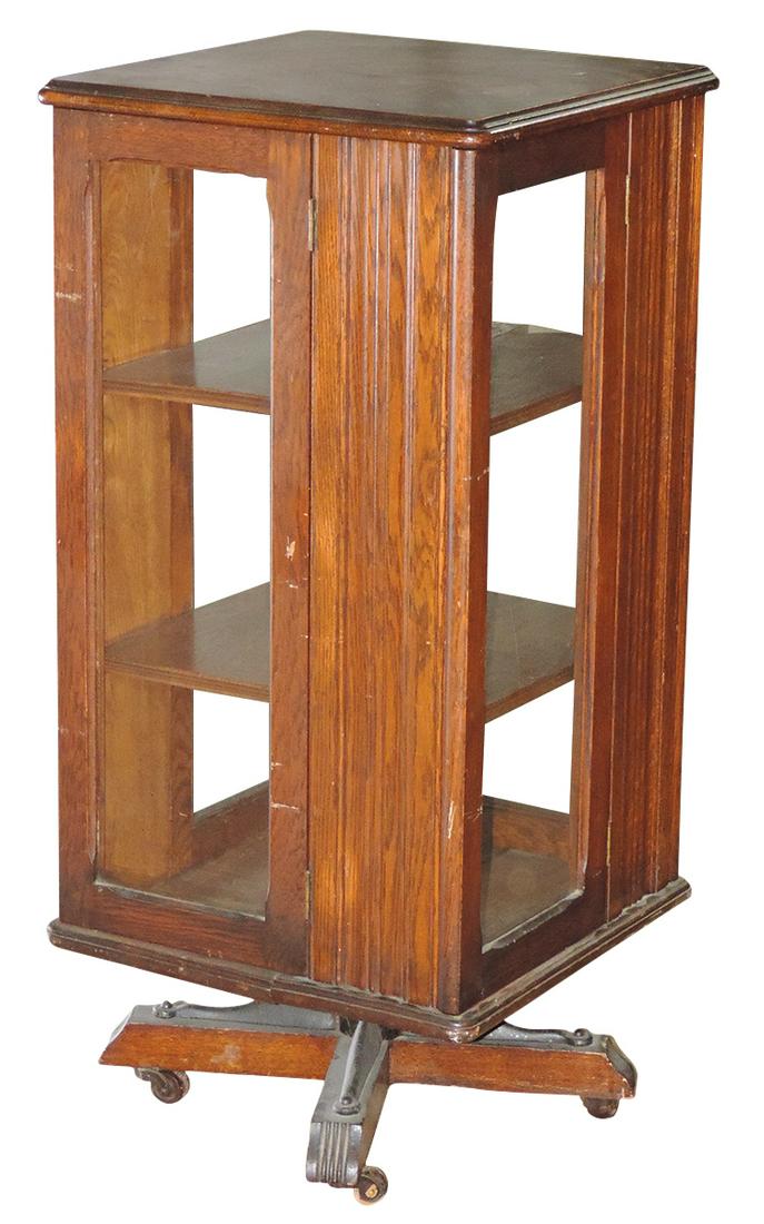 Furniture, revolving bookcase, oak w/4 glazed doors & beaded panels, raised on 4-legged base, VG (1 of 1)