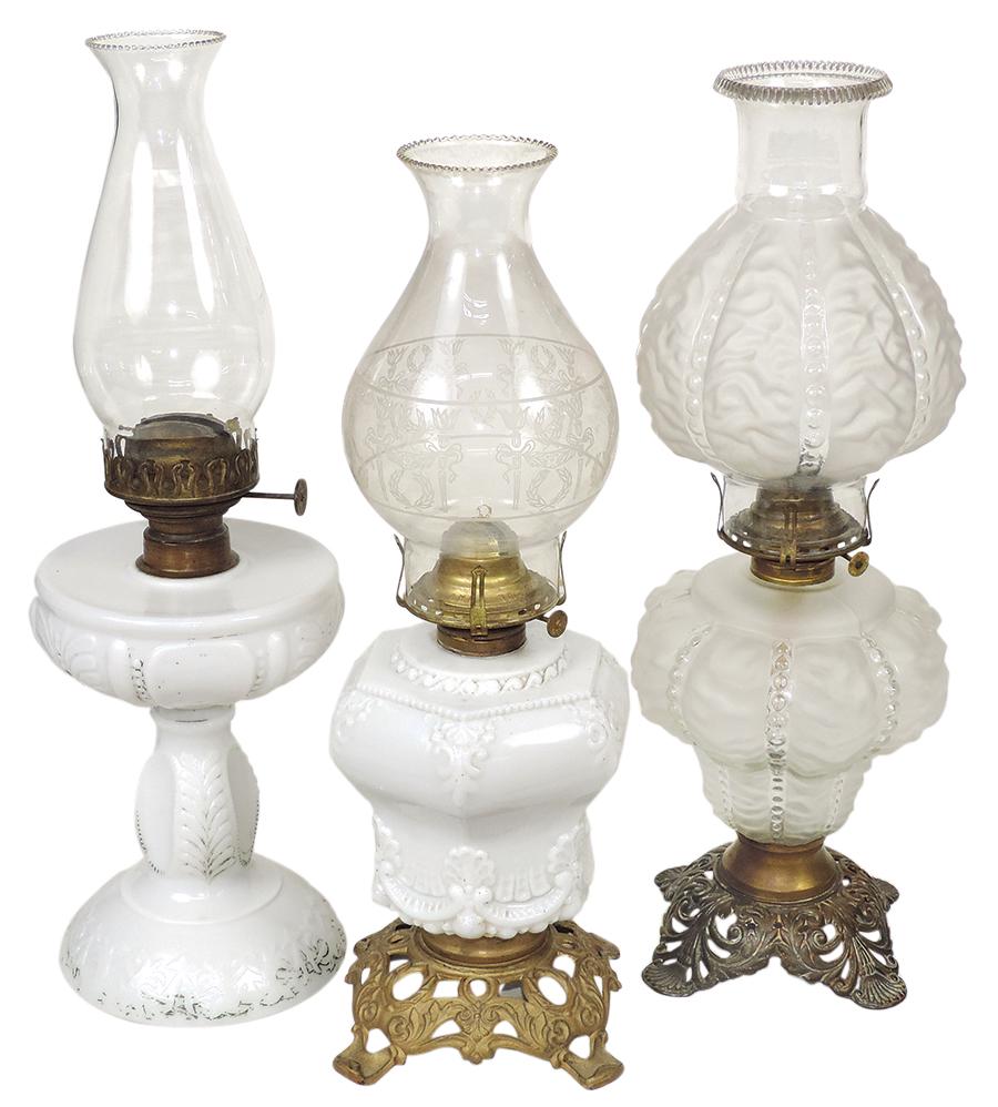 Lighting (3), pressed glass oil lamps, milk glass w/embossed ferns, milk glass w/metal base & satin: Lighting (3), pressed glass oil lamps, milk glass w/embossed ferns, milk glass w/metal base & satin beaded draped w/matching chimney/shade, VG to Exc cond, largest 19"H.
