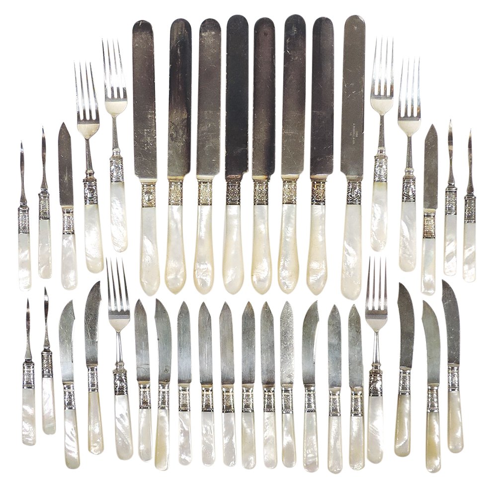 Flatware w/mother of pearl handles (41), 12 1884 J. Russell & Co. dinner knives (some w/edge wear),: Flatware w/mother of pearl handles (41), 12 1884 J. Russell & Co. dinner knives (some w/edge wear), 6 monogrammed forks, 19 small sharp knives & 5 nutpicks, ferrules marked Sterling, VG to Exc cond, d