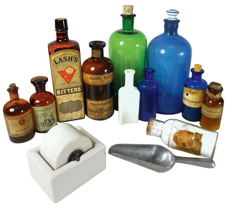 Drug store items (13), Lash's Bitters square brow: Drug store items (13), Lash's Bitters square brown glass bottle w/paper label & cork stopper, Sutliff & Case Co.-Peoria, ILL brown glass bottle, Oil Origanum "C" blue bottle w/paper label, Fritsche Br
