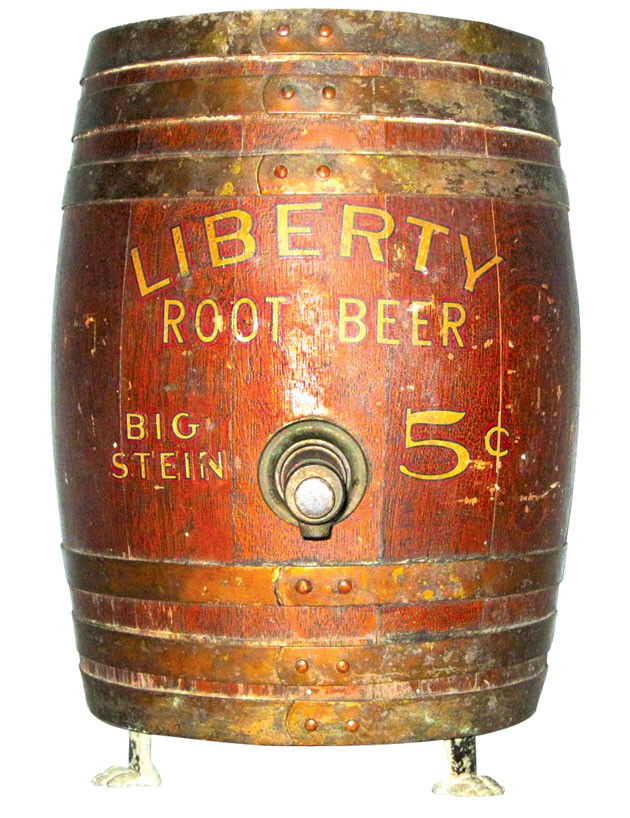 Soda fountain dispenser for Liberty Root Beer, mfgd by : Soda fountain dispenser for Liberty Root Beer, mfgd by Multiplex Faucet Co.-St. Louis, oak w/claw feet & orig decals, "Liberty Root Beer Big 5 Cent Stein", missing lid, o/wise VG cond, 12.5"H x 9"Dia.