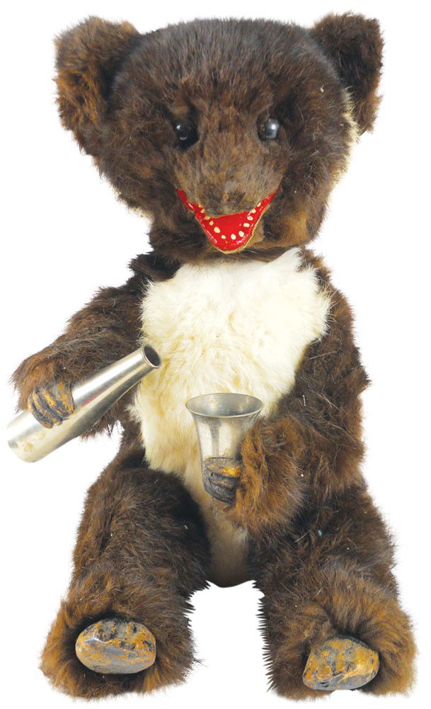 Toy, furry drinking bear w/metal bottle & glass, head &: Toy, furry drinking bear w/metal bottle & glass, head & both arms are movable but do not move when plugged in, missing end of nose, o/wise VG cond, 13"H.