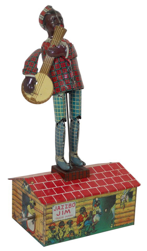 Toy, Jazzbo-Jim, c.1920's litho on metal wind-up, "The : Toy, Jazzbo-Jim, c.1920's litho on metal wind-up, "The Dancer on the Roof", banjo & plaid jacket, by Unique Art Mfg Co, VG cond w/slight paint scuffs, 10"H x 5"W x 3.25"D.