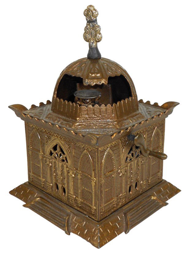 Mechanical bank, Mosque, mfgd by Judd Mfg Co.-Wallingfo: Mechanical bank, Mosque, mfgd by Judd Mfg Co.-Wallingford, CT, c.1880, cast iron w/orig gold paint, replaced finial, o/wise Exc cond, 7"H x 6"W.